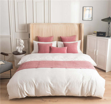 Bedding Sets with white duvet cover, pink accent pillows and coordinated sheets on a modern bedroom bed