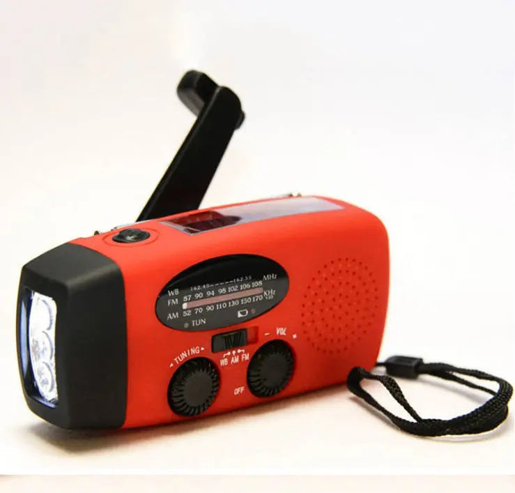 Solar hand crank USB charging radio flashlight null