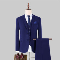Korean-style Casual Blazer Suit Jacket Three-piece Set navy slim-fit blazer, vest and trousers on mannequin for modern men fashion