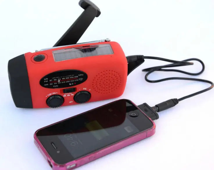 Solar hand crank USB charging radio flashlight null