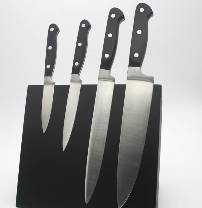 Tool storage rack MDF magnetic knife holder with four chef knives mounted on black board