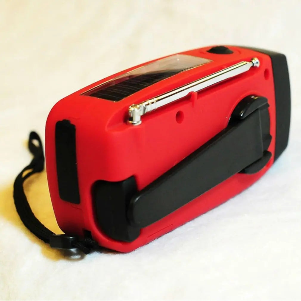 Solar hand crank USB charging radio flashlight null