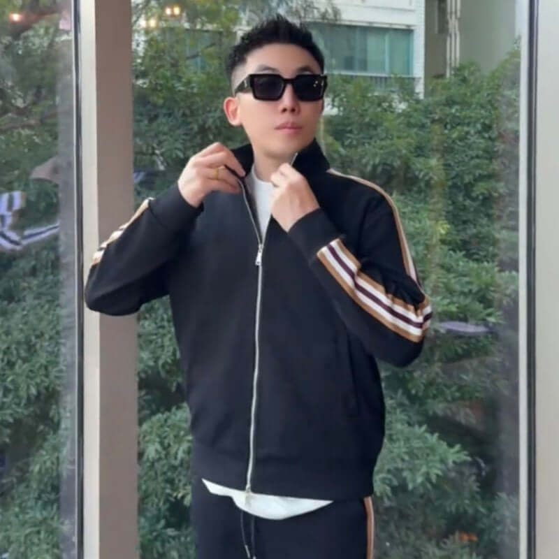 Affordable Luxury Patchwork Striped Casual Sports Suit High-End Stand-Up Collar Jacket And Pants Two-Piece Set men wearing stand collar jacket