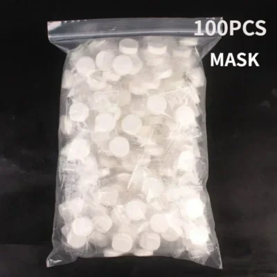 100pcs Disposable Compressed Facial Mask Portable Travel Non-woven Face Mask Skin Care Cotton Wrapped Masks Paper