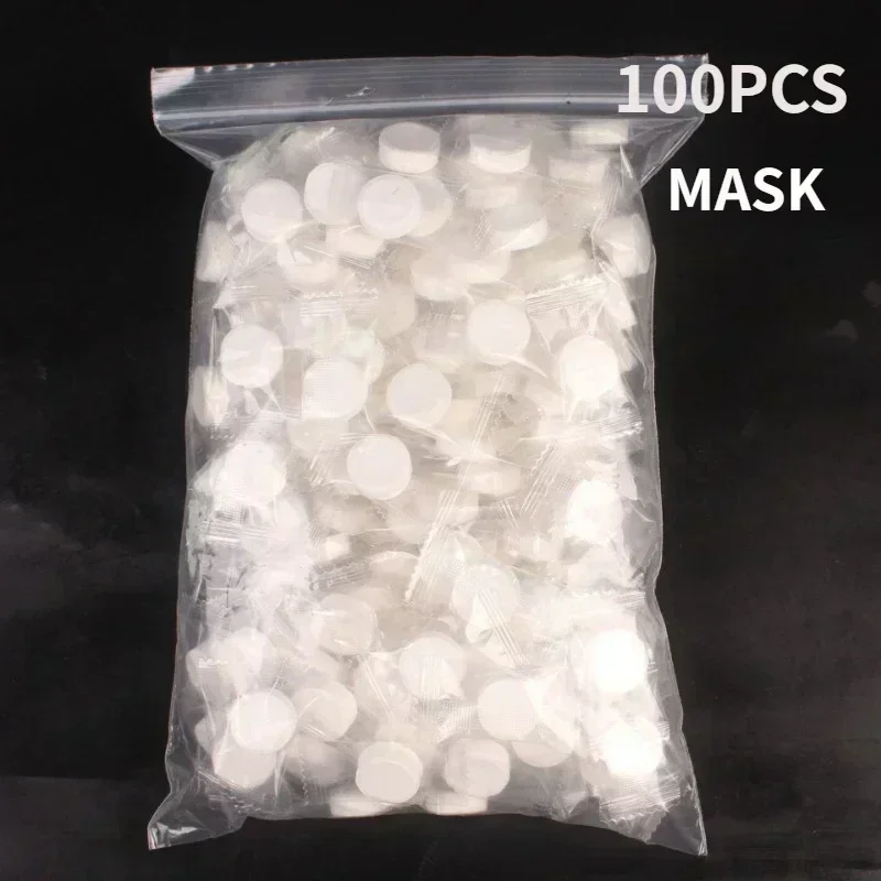 100pcs Disposable Compressed Facial Mask Portable Travel Non-woven Face Mask Skin Care Cotton Wrapped Masks Paper