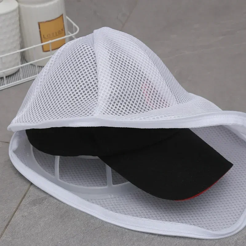 Hat washing bag, washing machine hat protection bag, hat cleaning laundry bag, anti-deformation mesh organizing bag with zipper.